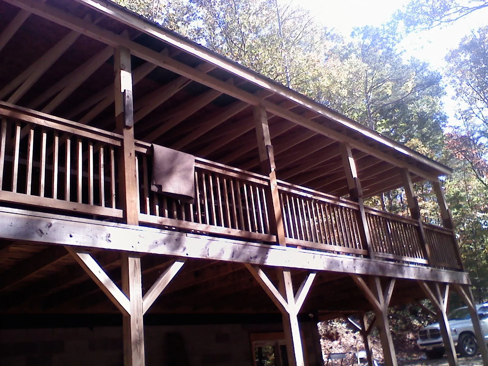 Timber framing under a new elevated porch and deck — Roof Leak Repair in Jackson Center by Roofing Brothers